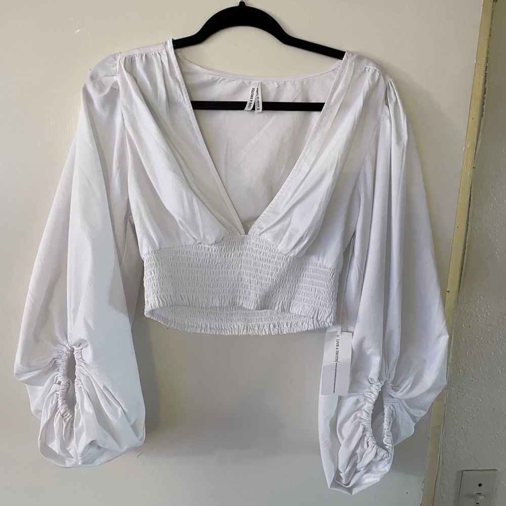 White v neck crop maiden puffer sleeve blouse .